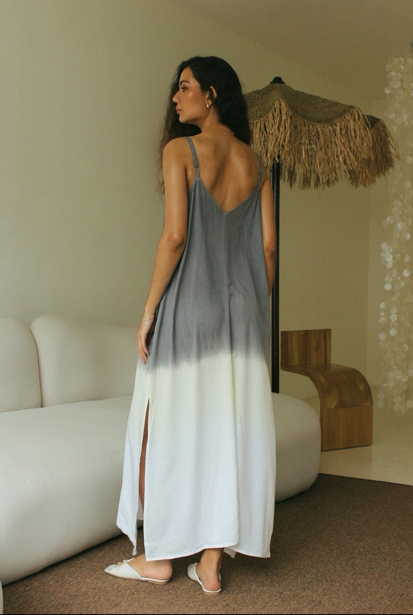 Back view of minimalist resort wear maxi dress in grey and white ombre tones - Tulalara