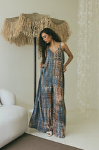 Women’s flowing resort wear Bali tie-dye wide leg jumpsuit with adjustable side ties - Tulalara