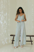 Handmade pastel green Bali tie-dye resort wear jumpsuit with adjustable side tie - Tulalara